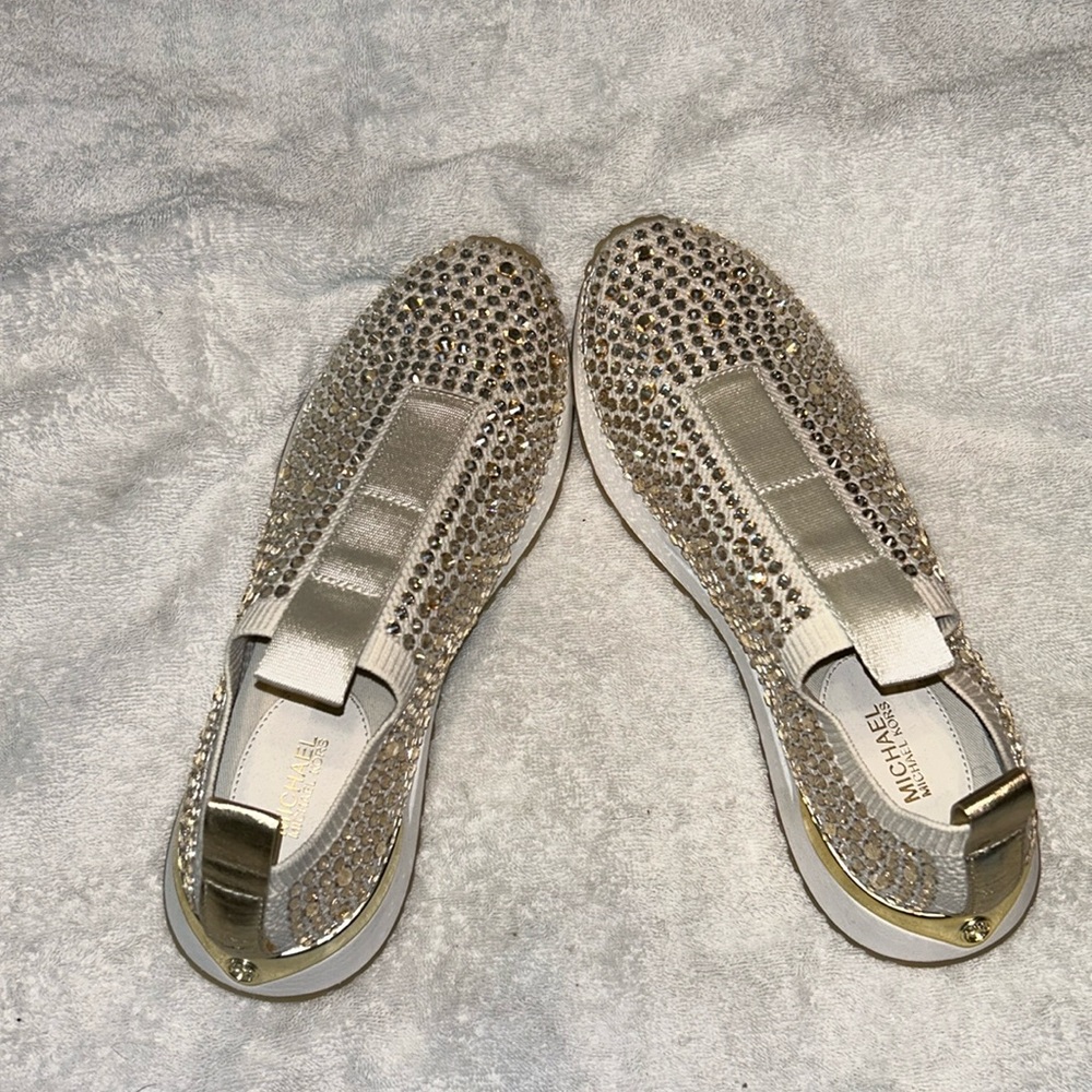 Brand New Michael Kors gold sequin studded sneakers.